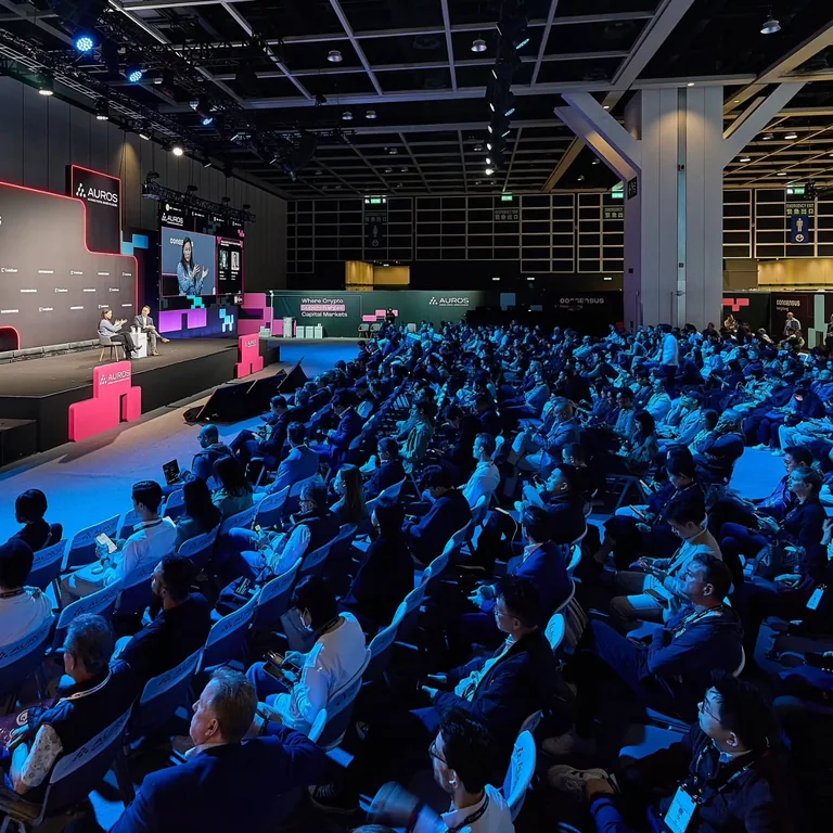 Speakers on stage and an audience at Consensus Hong Kong 2026